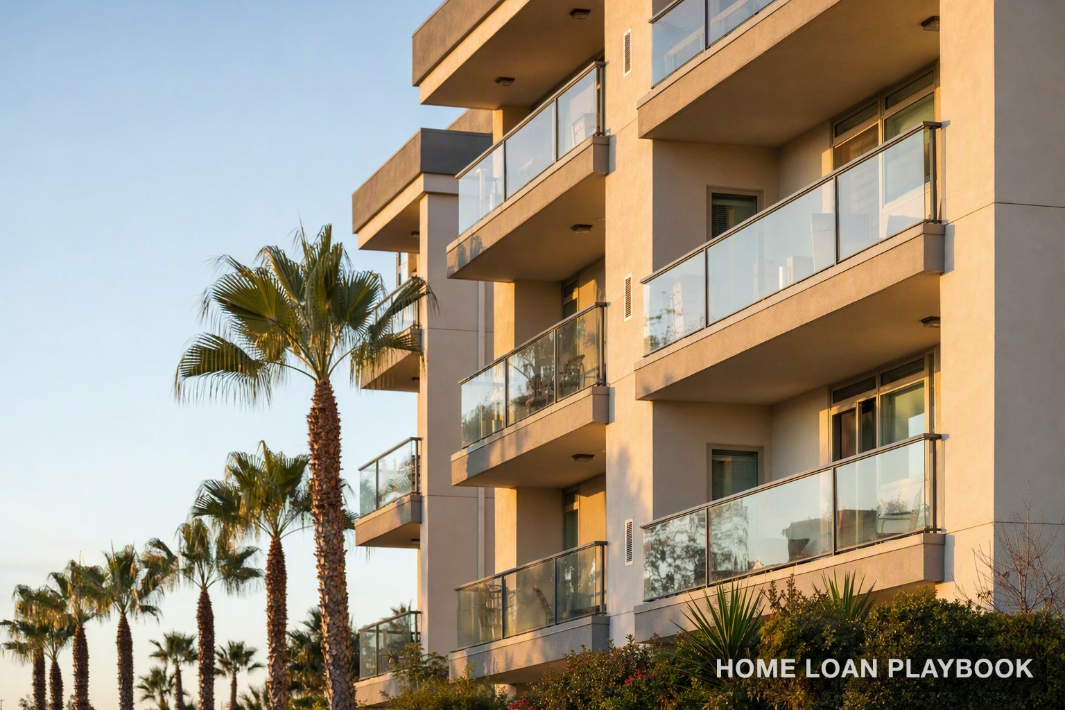 A California condominium building exterior at golden hour